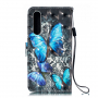 Pokrowiec flip niebieskie motyle do Huawei P30 - czarny